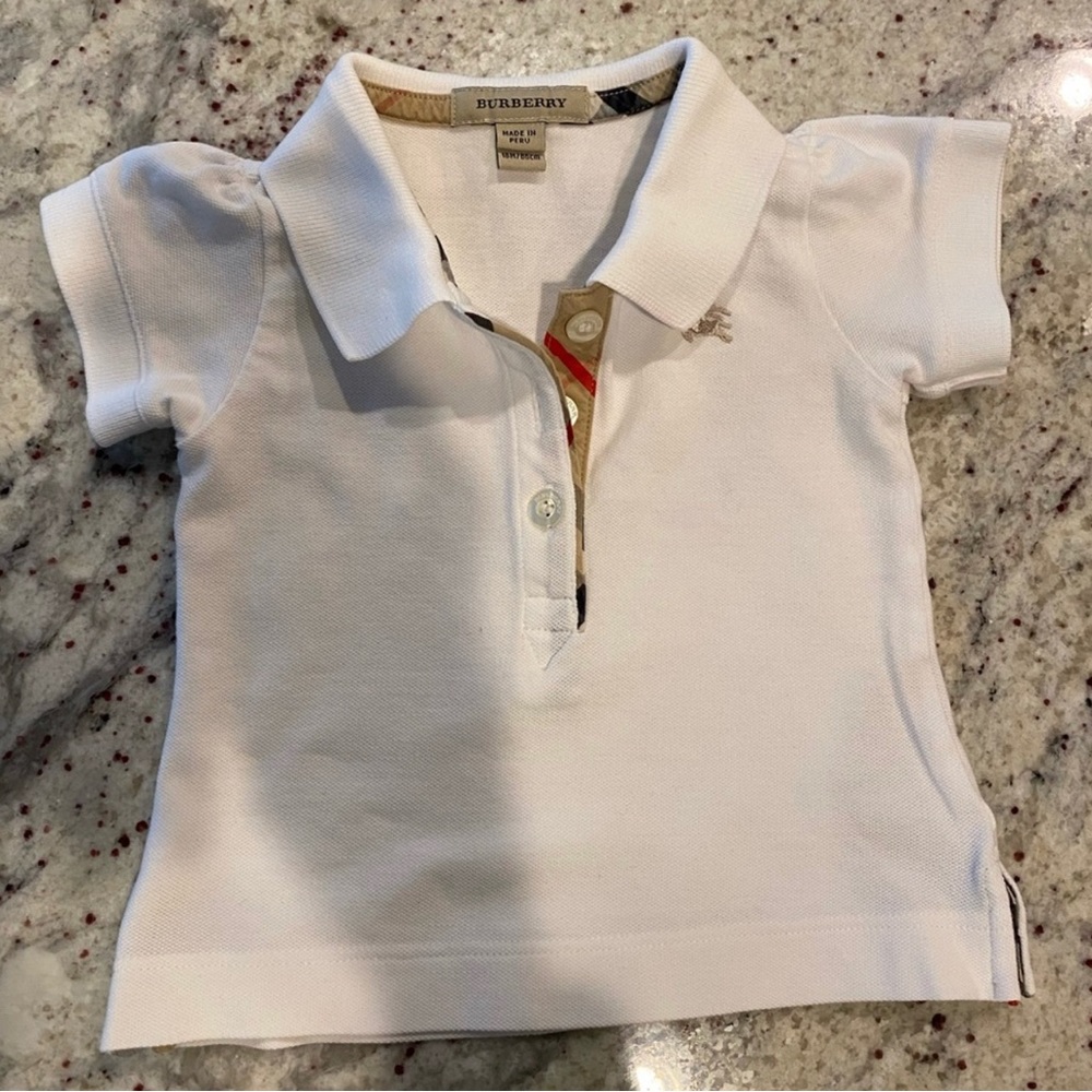 Authentic Burberry polo shirt for 12-18 months( girl).runs  small